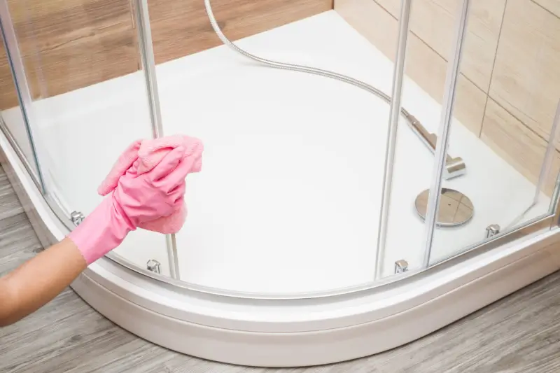 Professional cleaning shower in a bathroom.