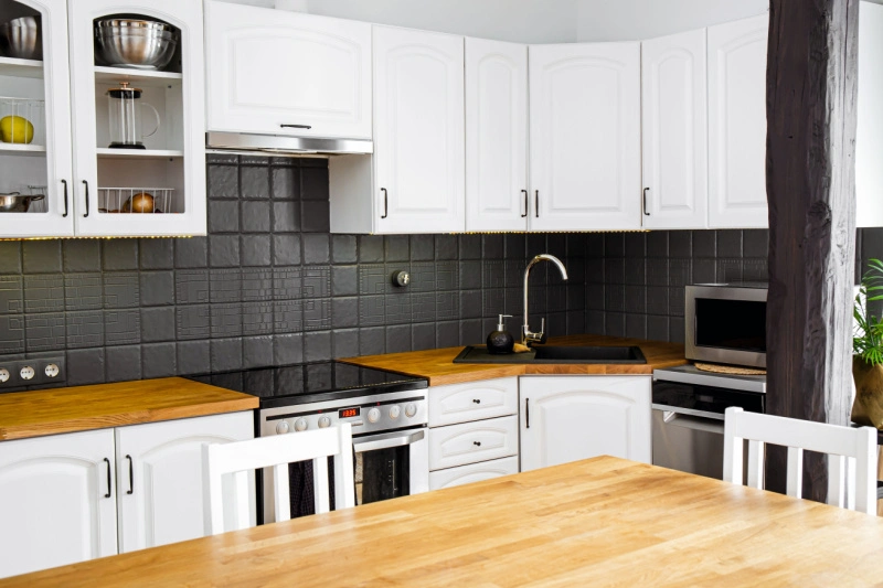 Kitchen with butcher block counter tops.