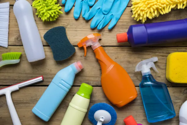 House cleaning products in a wood table