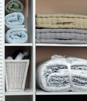 towels organized on bathroom shelves