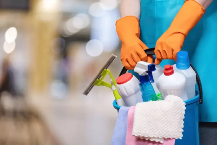 Bucket full of cleaning supplies