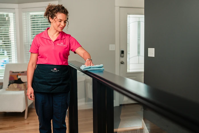 A Molly Maid professional providing one-time cleaning service 